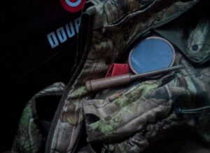 Turkey call on a turkey vest